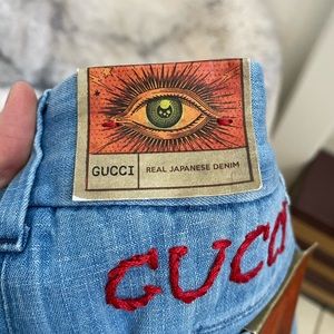 GUCCI TAPERED JEANS AMOUR WITH EMBROIDERED LOGO